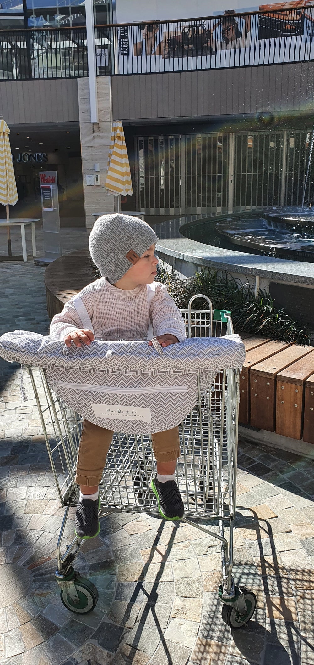 Shopping Cart Cover for Kids: Features a high back, extended sides, and a secure buckle, ensuring your child stays safe and snug in any shopping trolley.