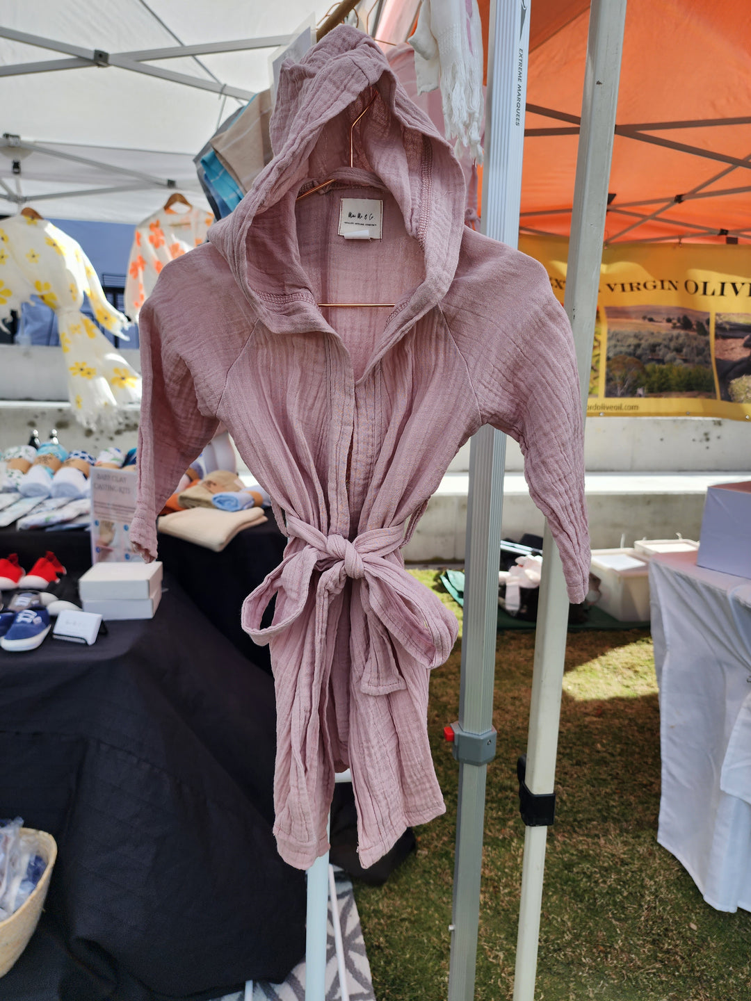 "Powder pink swim robe for kids, handmade with luxurious organic Turkish cotton for comfort and quick drying.