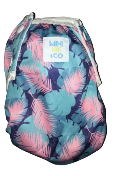 Large Feather Swim Nappy: Embrace playful style with our large feather swim nappy! Perfect for beach trips and swimming lessons, this nappy combines a chic feather design with exceptional leak-proof functionality. Made from soft, eco-friendly materials, it offers a comfortable fit for toddlers 13.5kg and up, allowing for unrestricted movement. Reusable and durable, it’s a sustainable choice that keeps your little one looking great while enjoying the water.

