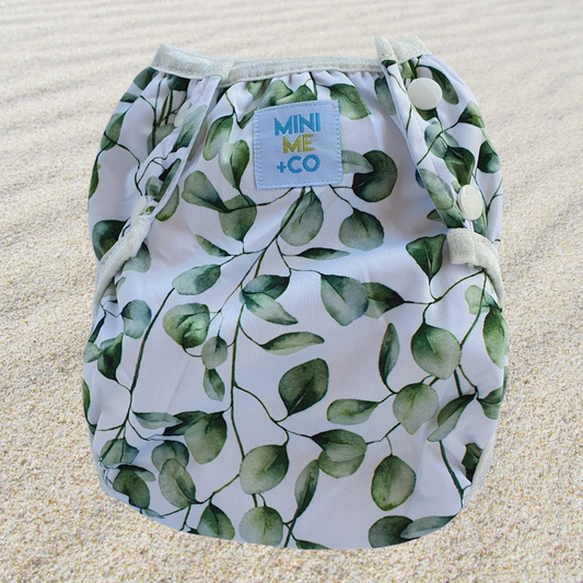 Mini Me & Co Eucalyptus Reusable Swim Nappy: An adjustable swim nappy featuring a serene eucalyptus design, perfect for beach outings and pool fun.