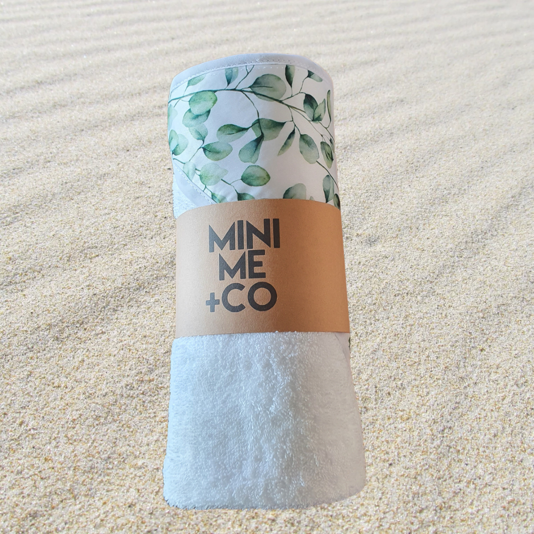 Eucalyptus Leaves themed baby hooded towel by Mini Me & Co, perfect for keeping little ones cozy after bath time.