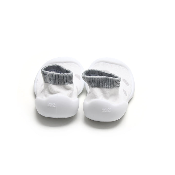 Stylish white and grey leopard print sock shoes, perfect for first walkers with seamless comfort.