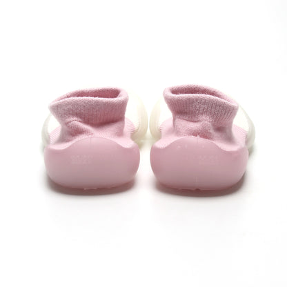 Pink and white two-toned sock shoes with seamless comfort and breathable fabric for little feet.