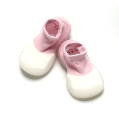 Cute and comfortable pink and white sock shoes with easy slip-on design, perfect for active toddlers