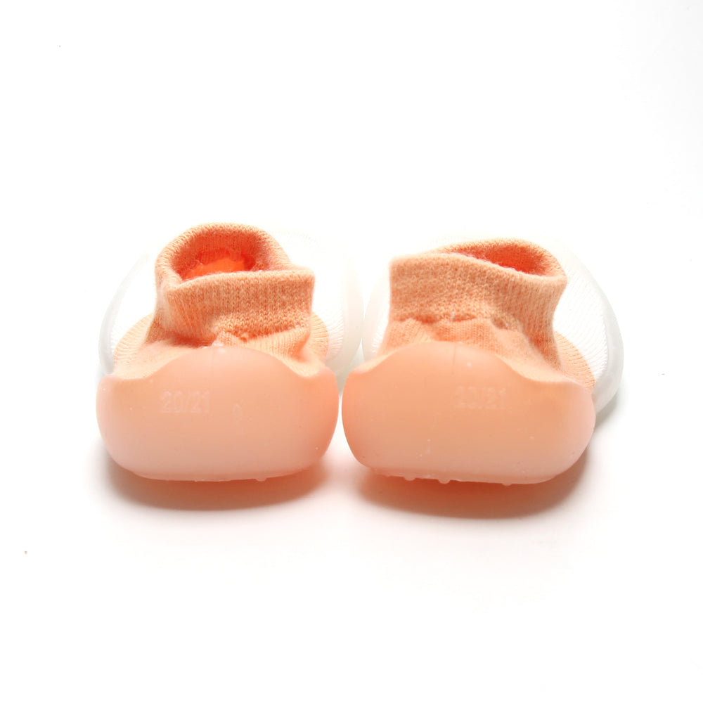 Stylish peach and white sock shoes, perfect for first walkers with comfortable fit.