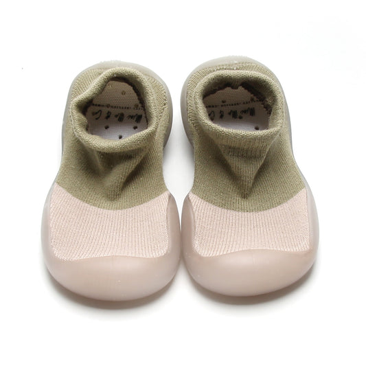 Khaki and bone two-toned sock shoes for kids with a soft cotton upper and flexible, non-slip rubber sole.