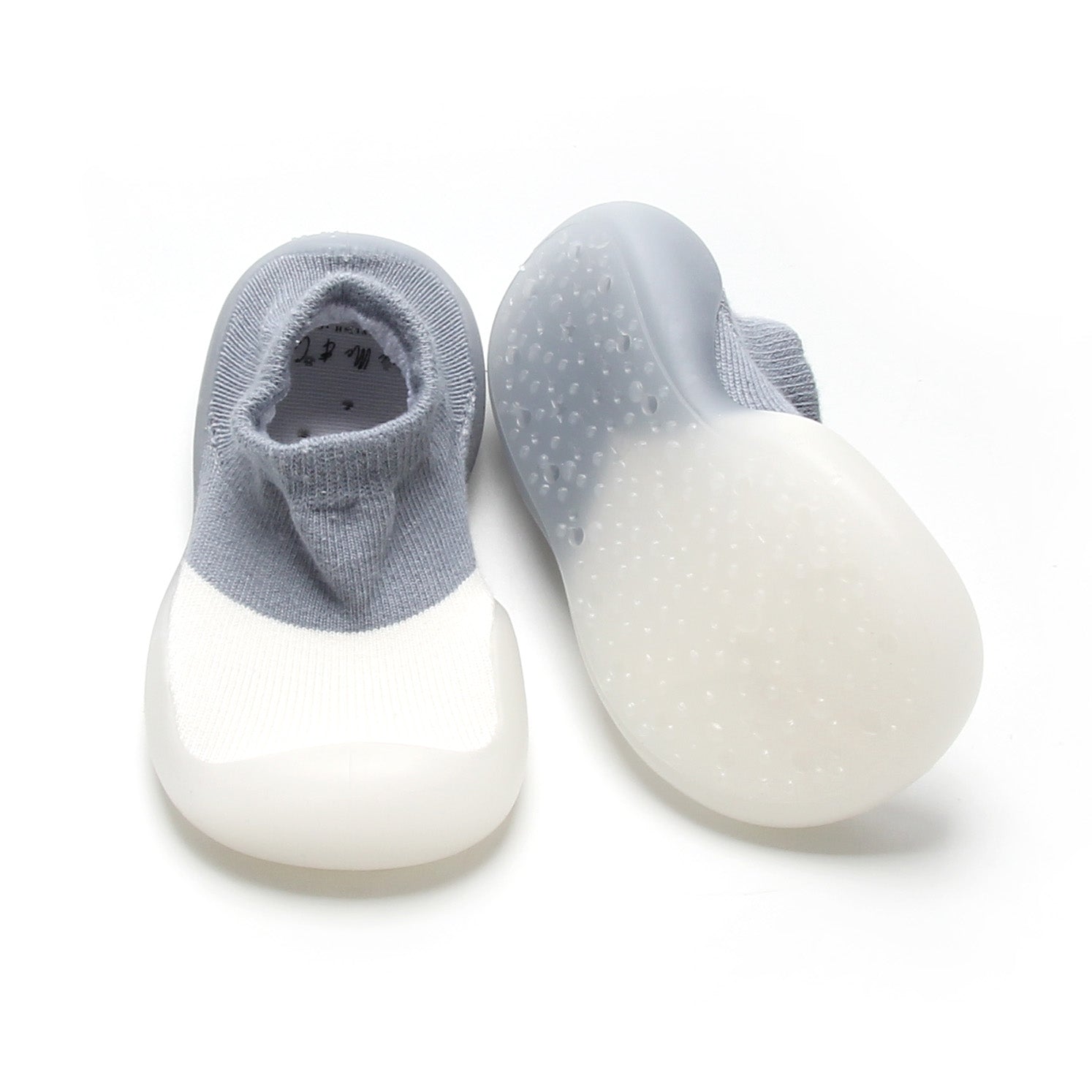 Stylish blue and white two-toned sock shoes for first walkers, offering comfort and support.