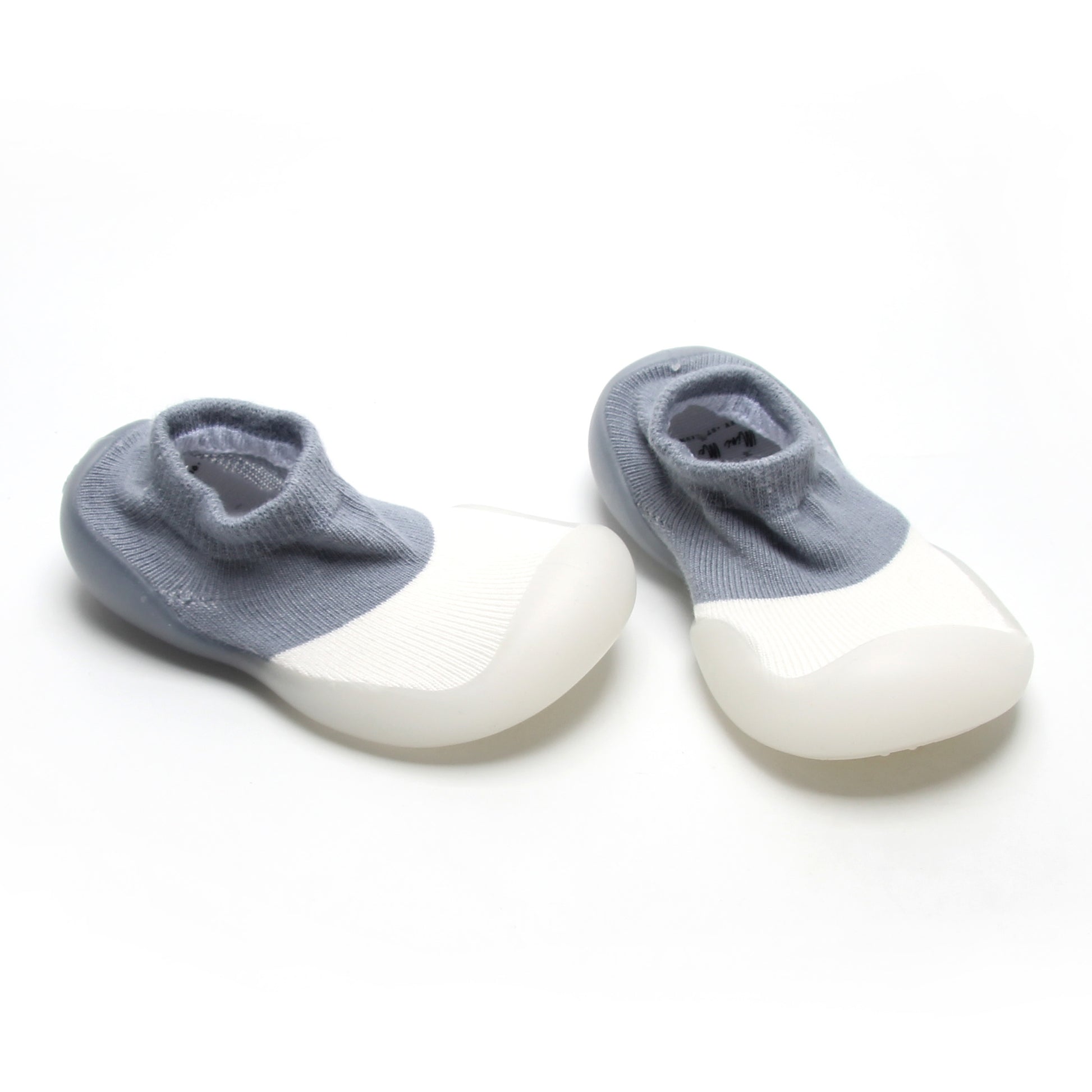 Blue and white two-toned sock shoes with soft cotton upper, ideal for little adventurers.