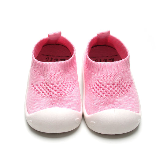 Pink kids mesh shoes with breathable fabric and flexible, non-slip sole.