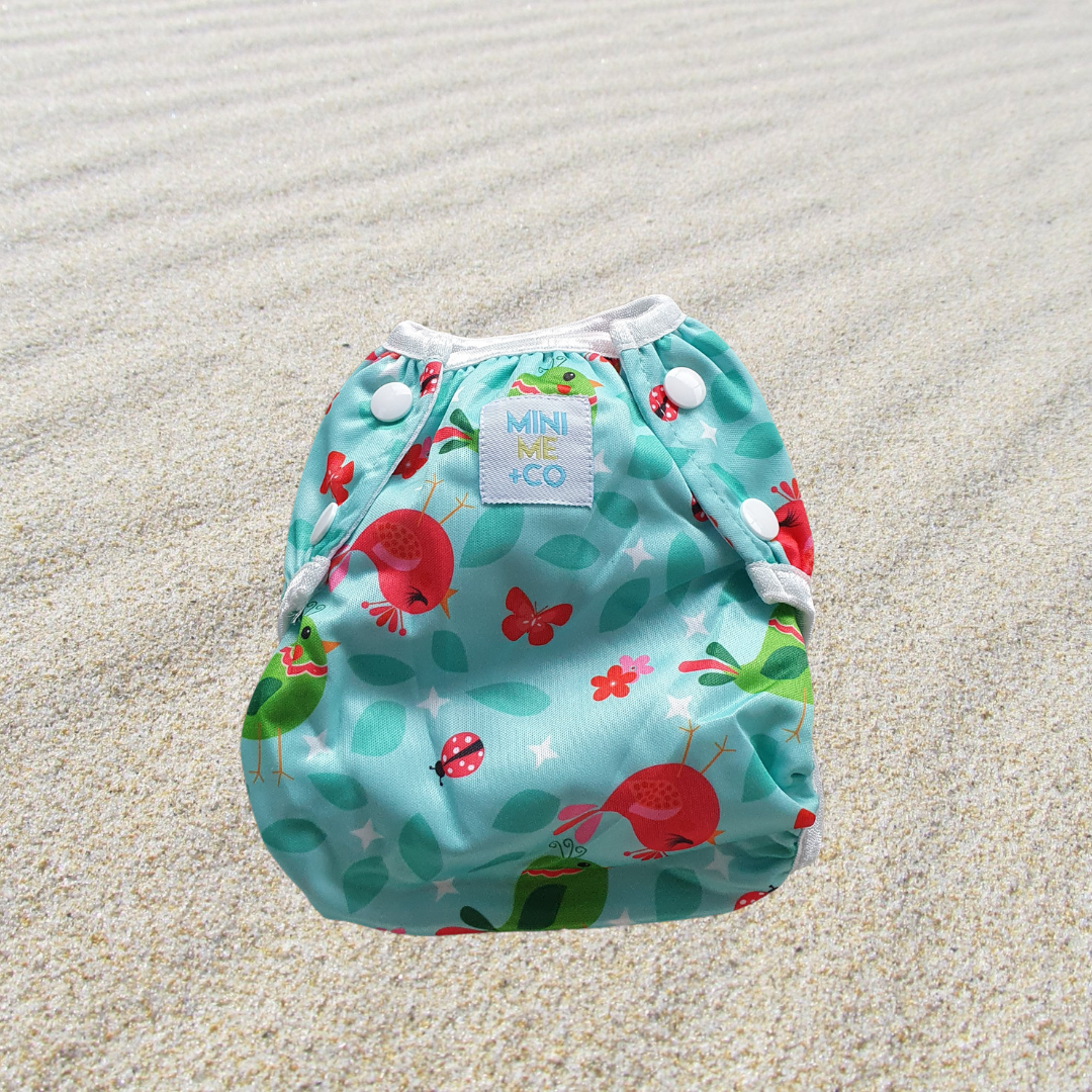 Mini Me & Co Bird Reusable Swim Nappy: A vibrant, adjustable swim nappy featuring a playful bird design, perfect for babies and toddlers.