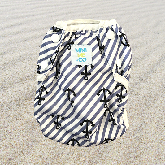 Mini Me & Co Anchor Reusable Swim Nappy: An adjustable swim nappy featuring a classic anchor design, perfect for beach days and pool outings.