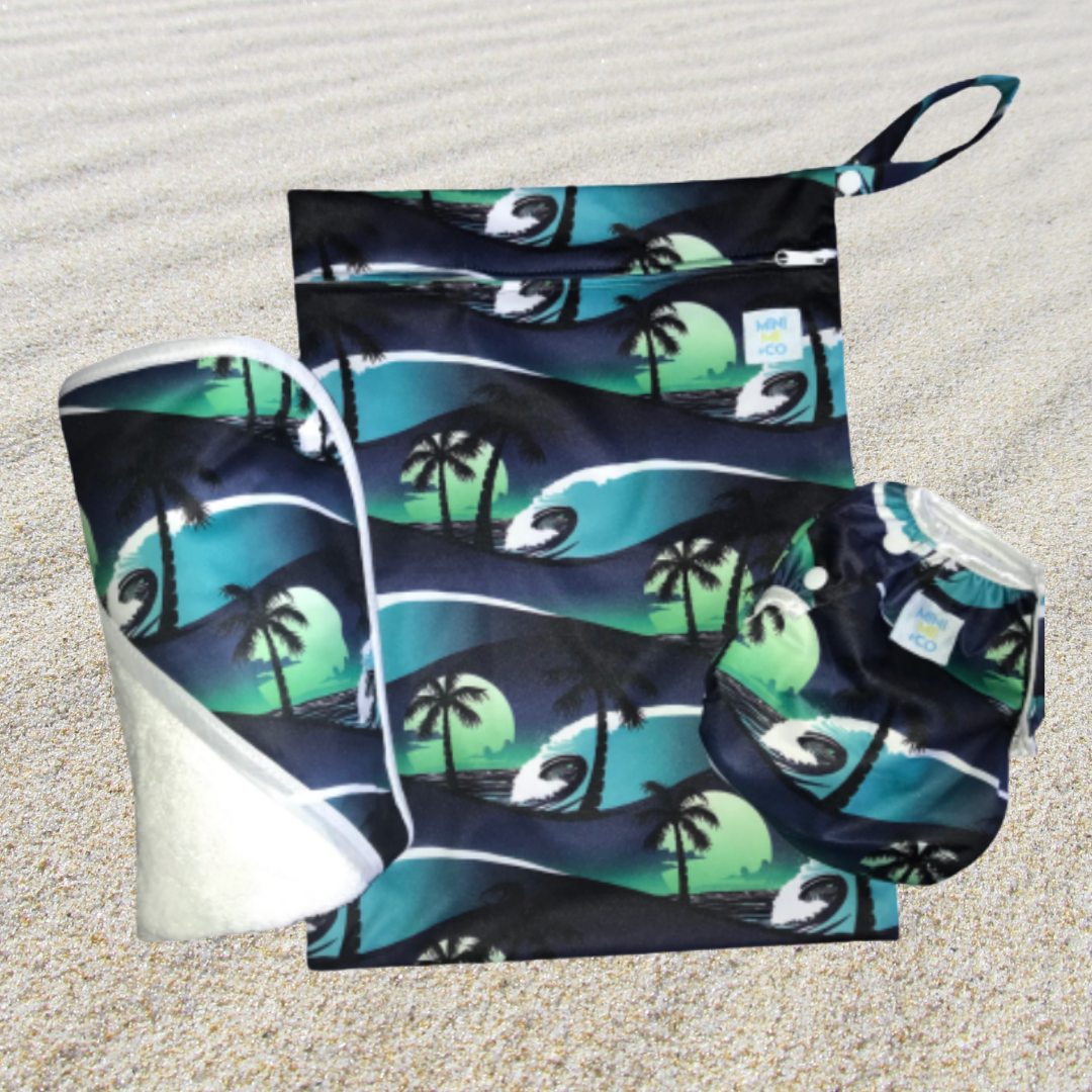 The Palm Tree Swim Package is a delightful collection of swim essentials designed for families who love fun in the sun. Featuring a colorful swim towel with an eye-catching palm tree print, this package is perfect for drying off after a splash in the water. Alongside the towel, you’ll find a matching waterproof wet bag to keep wet items secure, as well as a comfortable reusable swim nappy that fits snugly for little ones. This stylish and eco-friendly package ensures your beach and pool days are both enjoya