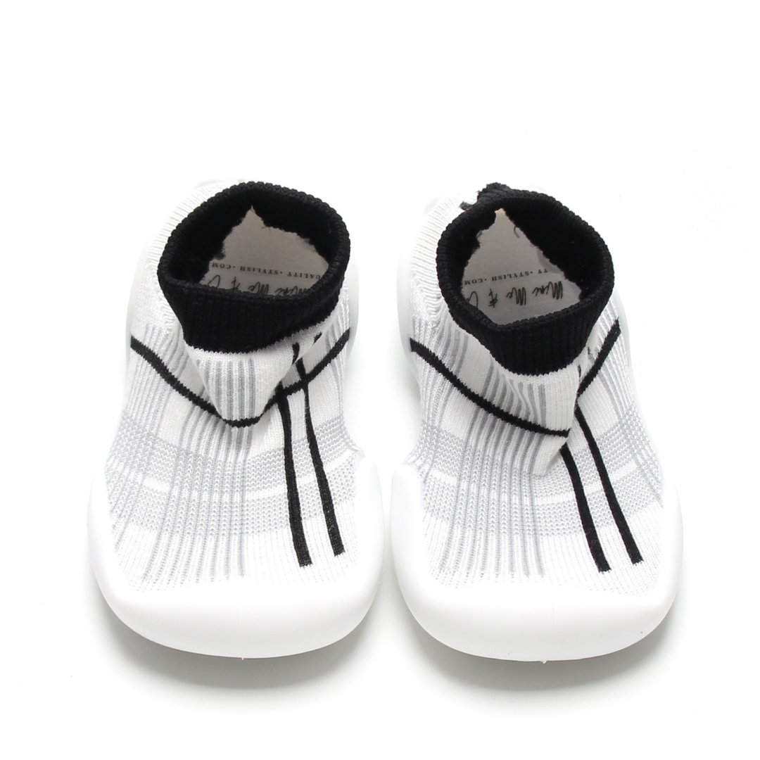 Grey and white tartan sock shoes for kids with flexible non-slip rubber sole.