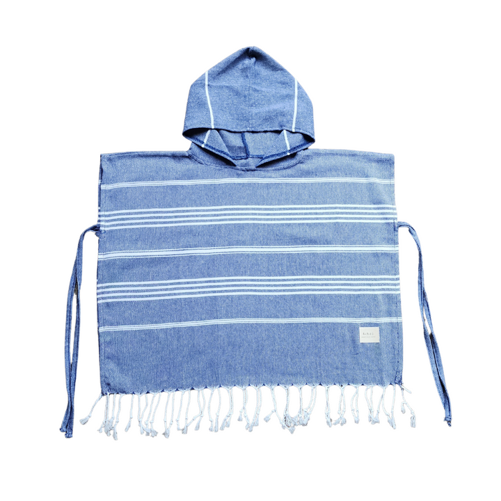 Luxurious kids poncho towel made from 100% organic Turkish cotton, showcasing soft texture and stylish design.