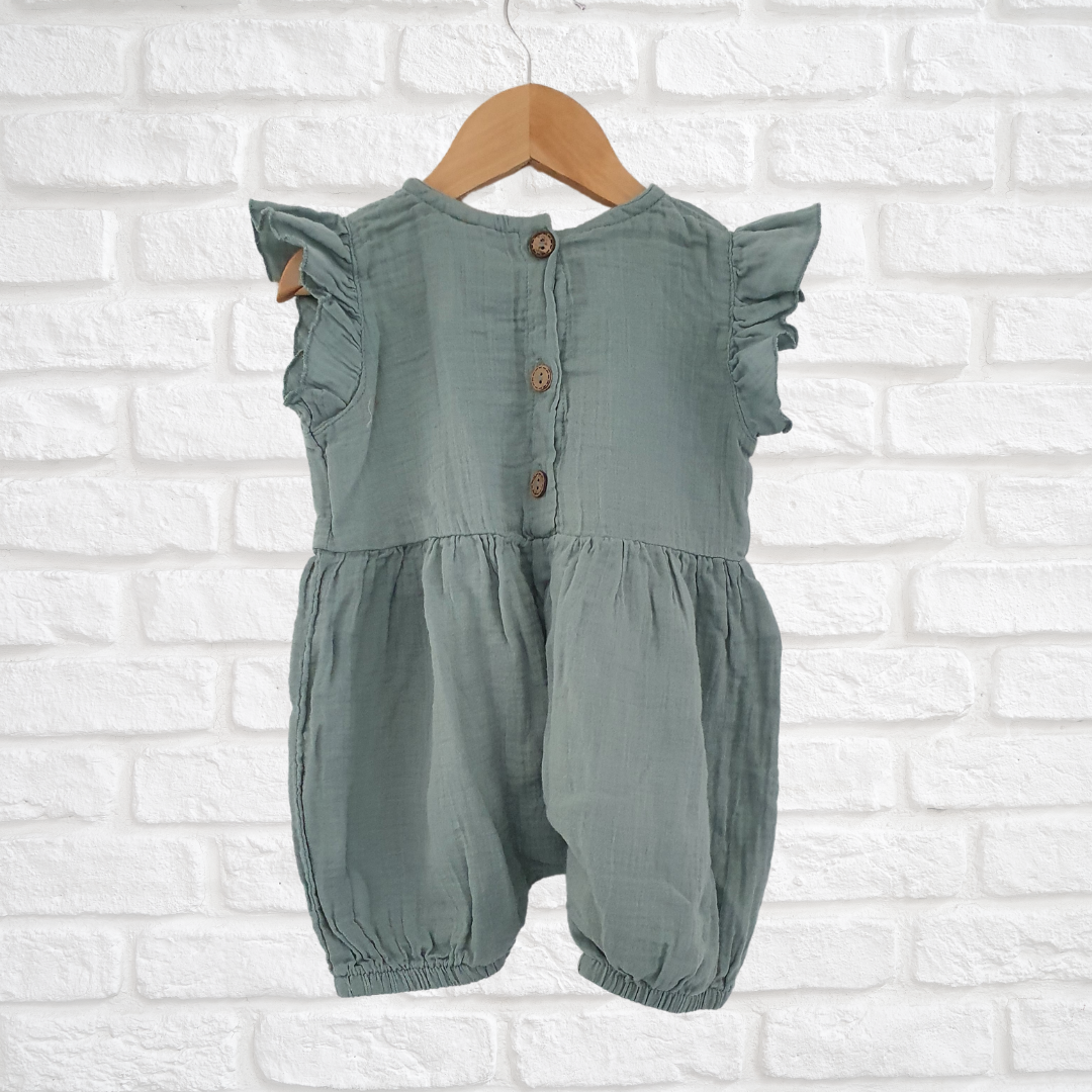 Handmade organic cotton short overalls with button back and ruffle details
