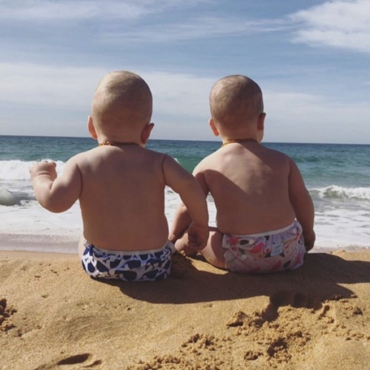 Mini Me & Co whale design reusable swim nappy with adjustable fit for babies and toddlers.