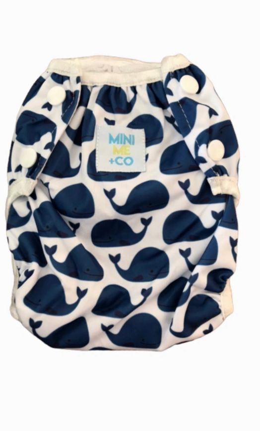 Whale-themed reusable swim nappy by Mini Me & Co, crafted for comfort and durability in the pool.