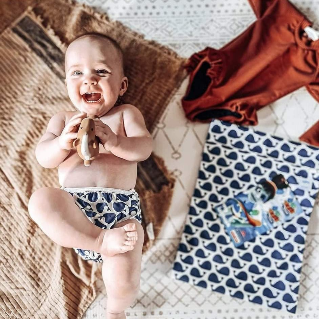 Eco-friendly whale-patterned swim nappy by Mini Me & Co, featuring leak-proof protection.