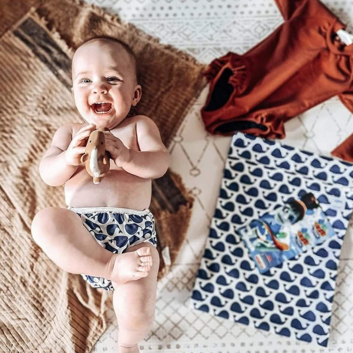 Eco-friendly whale-patterned swim nappy by Mini Me & Co, featuring leak-proof protection.